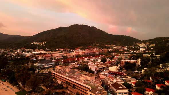 Aerial Sunset View Of Phuket Urban Landscape Beside Kata Beach. Dolly Forward