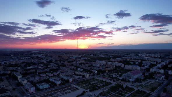 Pink Sunset Over a Small Town