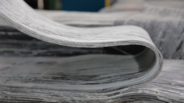 Rubber Tape on a Large Tire Factory Close Up