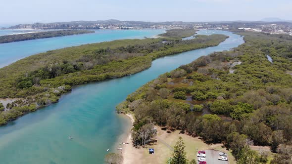 Descending over the Pelican island and Hastings River at the Woregore Nature Reserve Australia, Aeri