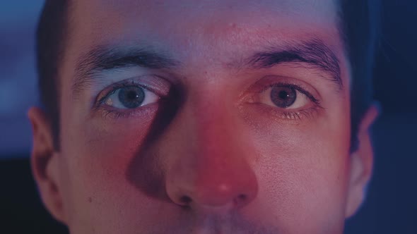 Closeup Portrait of Young Guy Watching Movie Tv Film at Night