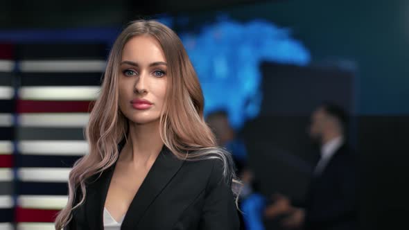 Medium Close Up Portrait of Young Blonde Business Feminine in Stylish Suit Posing at Hi Tech Screen