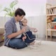 Father teaching his baby son not to touch electric plugs - VideoHive Item for Sale