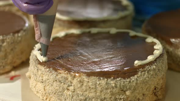 Cakes Being Decorated