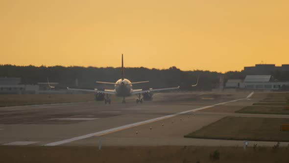 Airplane Landing at the Early Morning