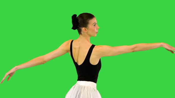 Young Ballerina Runs Slowly Making Arms Movements on a Green Screen Chroma Key