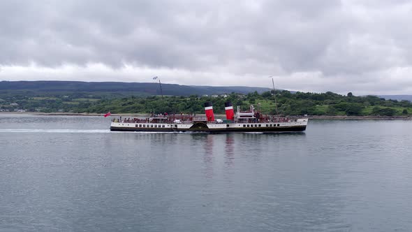 A Paddle Steamer Taking Tourists on a Sea Tour