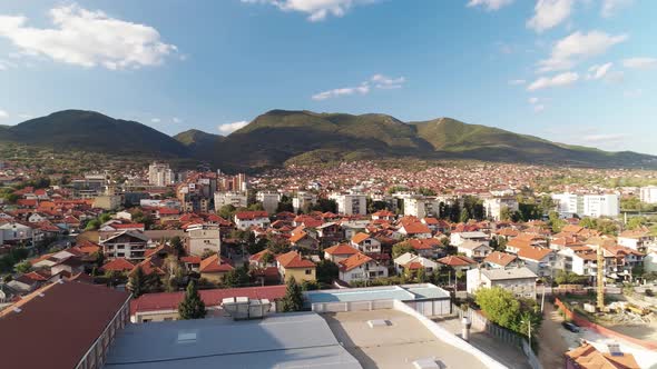 Town in southeast Europe, drone shot red roofs in Vranje, Serbia