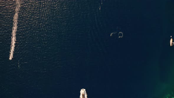 Towards Ships In Blue Sea Off Coastline Of Cap De Creus