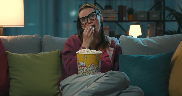 Woman watching her favorite series on TV