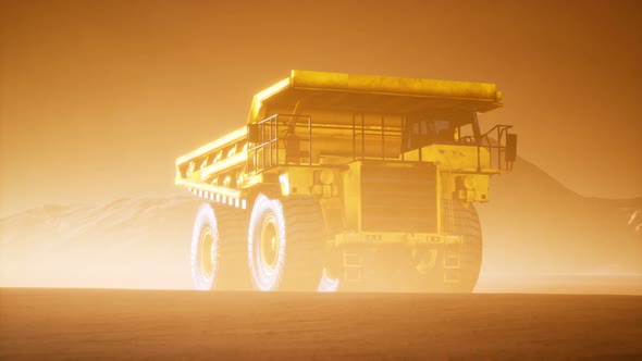 Big Yellow Mining Truck in the Dust at Career