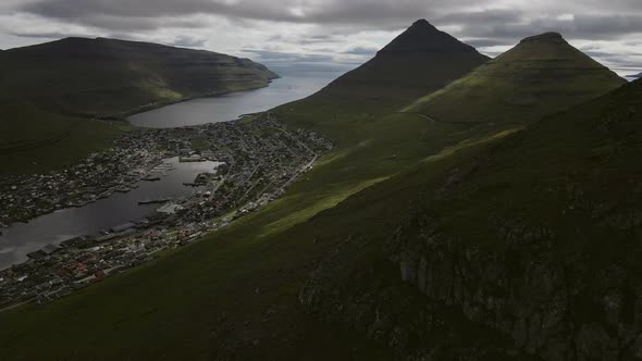 Drone Over Hikers On Klakkur With Klaksvik Town Below