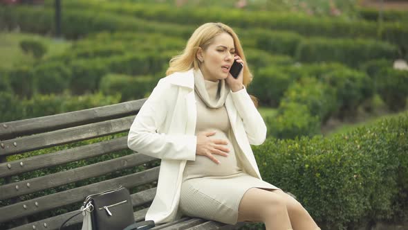 Pregnant Woman Calling Hospital Phone, Suffering Abdominal Pain, Prenatal Care