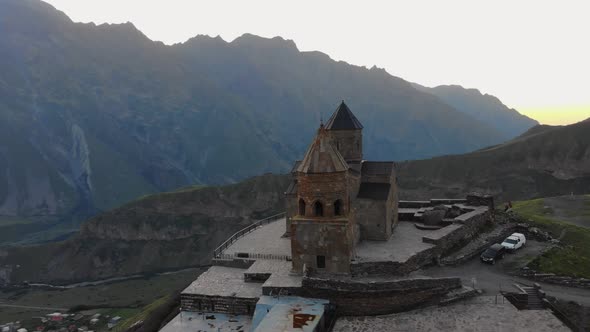 Aerial View At The Gergeti Trinity Church Tsminda Sameba