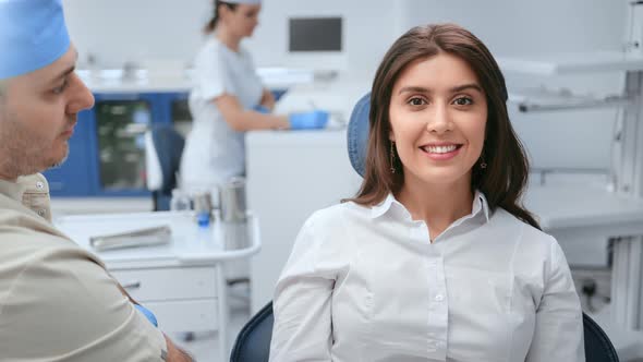 Happy Woman Posing at Stomatologist Chair Visit Doctor Checking Teeth Health Regular Diagnostic