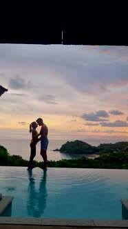 Couple Men and Women on a Luxury Vacation at a Pool Villa