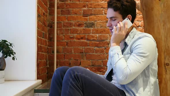 Man Talking on Mobile Phone, Attending Call, Loft Interior