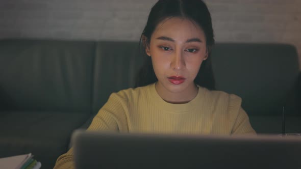 Stressed Woman Working on Laptop