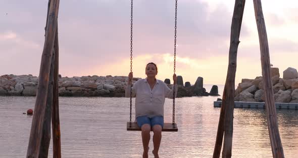 Swinging on Loneliness Beach