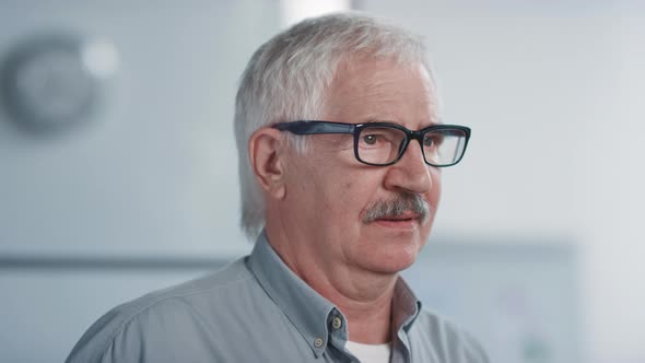 Caucasian Man In Eyeglasses Portrait