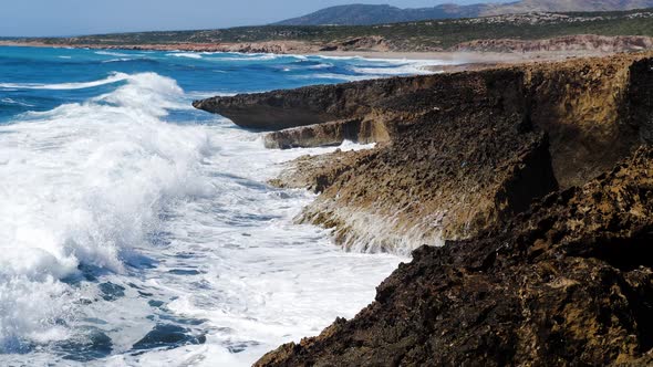 Sunny Daytime Seascape Devastating and Spectacular Sea Storm Ocean Waves Crash on the Rocks of the