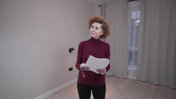 Customer Seniop Woman Checking Empty Apartment