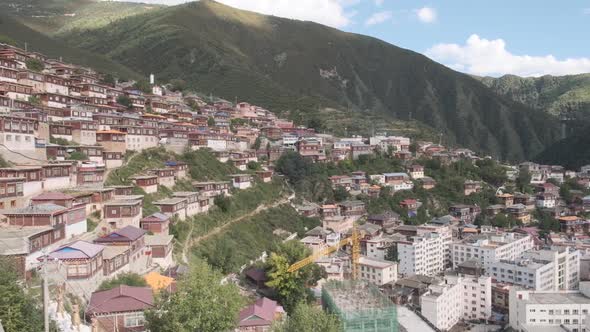 Wooden houses on foot of mountain