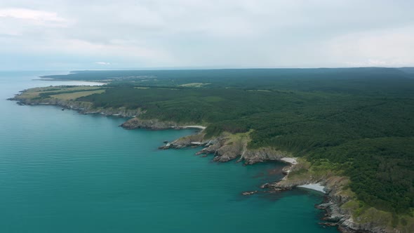 Drone flight above a picturesque rocky coastline