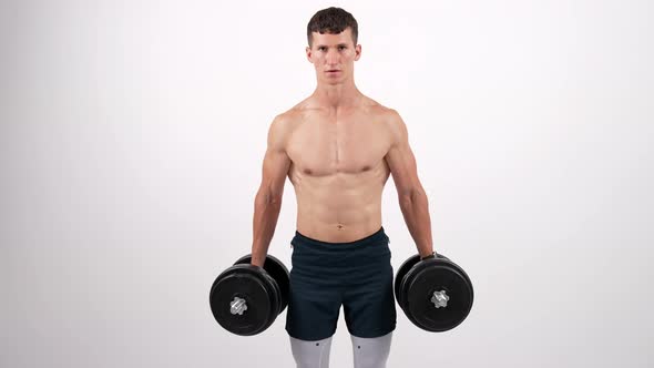 Muscular Man Lifting Fitness Dumbbell on White Background Strength