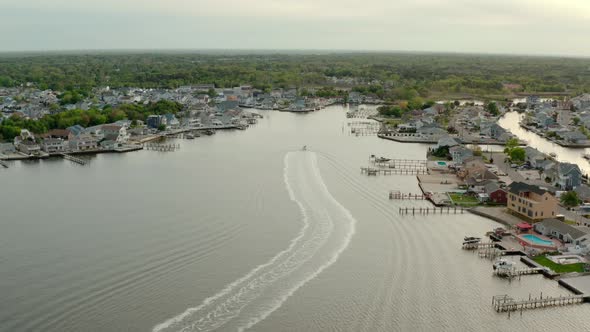 Aerial Drone of Local Residential Suburb of River in View of Distant Toms River