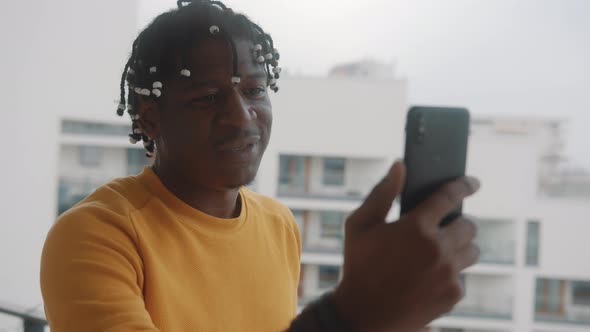 African American Black Man Having a Video Call with His Family