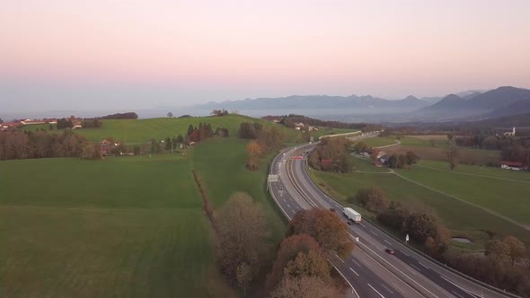 Aerial view of highway interstate road with fast moving traffic in europe.