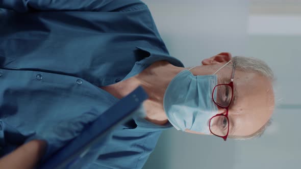 Vertical Video Elder Patient Attending Checkup Examination with Nurse