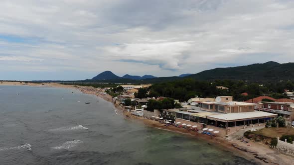 Aerial footage of the beautiful small town known as St George South, Greek city of Corfu in Greece