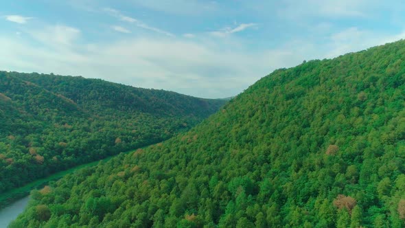 Aerial Video of Clouds Mountains Forest and Mountain River