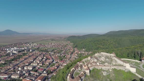 Aerial of Rasnov town and fortress