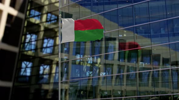 Madagascar Flag Waving On A Skyscraper Building