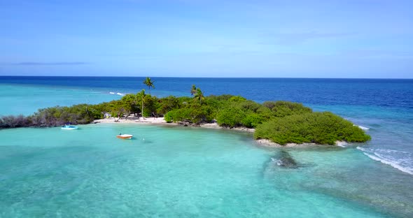 Luxury fly over tourism shot of a summer white paradise sand beach and aqua turquoise water background