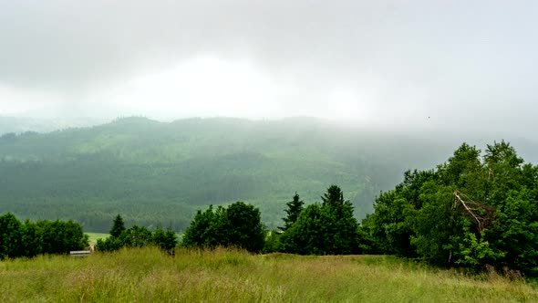 Clouded hills.