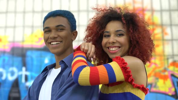 Positive Stylish Young Couple Smiling Camera Having Fun, Modern Teenage Fashion