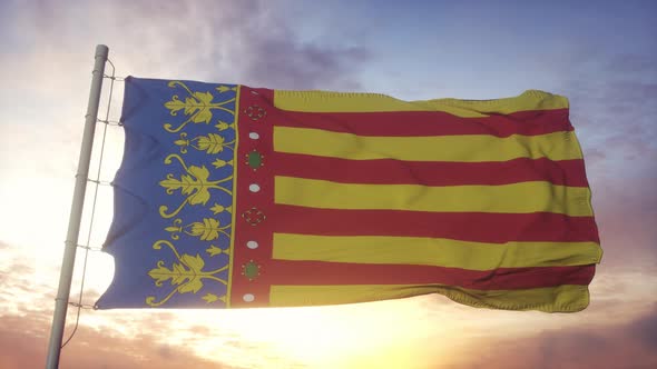 Valencian Community Flag Spain Waving in the Wind Sky and Sun Background