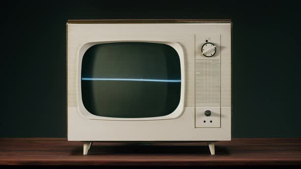 Old Television with Grey Interference Screen on Black Background