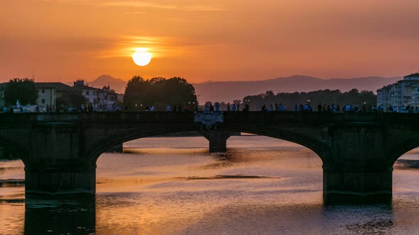 Cityscape View on Arno River with Famous Holy Trinity Bridge Timelapse on the Sunset in Florence