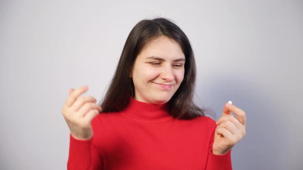 A Woman Chooses What to Eat an Apple or a Pill with Vitamins Eats a Pill