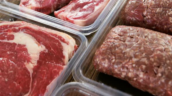 Varieties of meat in plastic boxes