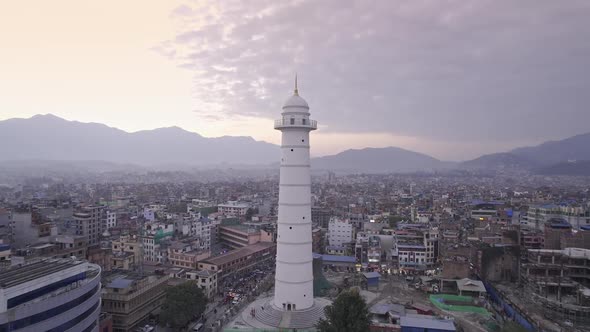 Aerial view flying past the Dharahara Tower in Kathmandu