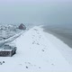 Seawall of Dunkirk in snow with some people, Dunkerque, France - VideoHive Item for Sale