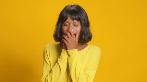 Shocked Young Woman Feels Very Happy To Win Something Pleasant Yellow Background