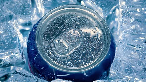 Aluminum Soda Tin Can Lid Cover of Soft Drink on Ice Goes Around the Circle