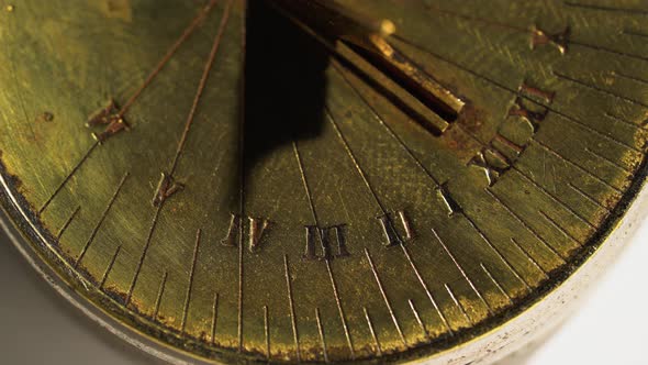 Solar Vintage Clock. White Background. Close Up